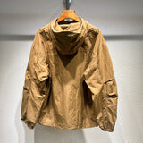 Side profile of Louis Vuitton luxury clothing with label-forward styling