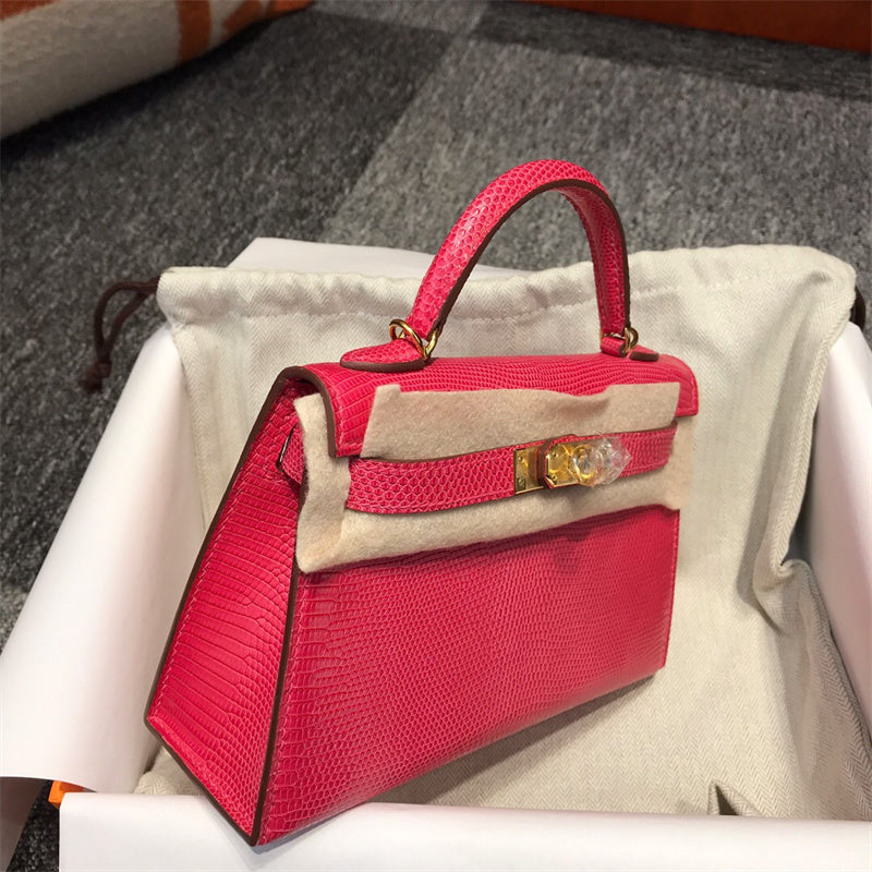 Side view of streamlined structured handbag
