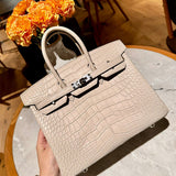 Sculpted handbag styled for everyday wear