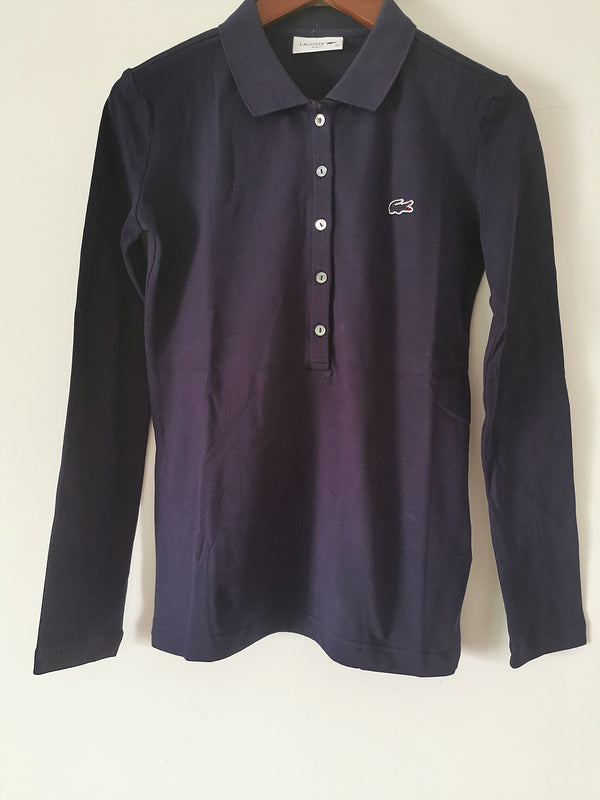 Front view of Lacoste luxury clothing with logo-detail design
