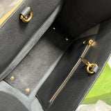 Close-up detail of structured chic women's handbag – women's designer-style accessory
