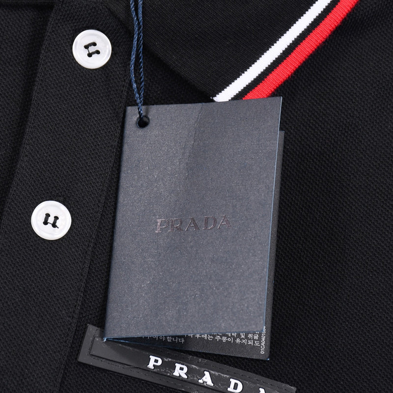 Flat lay presentation of Polo cotton polo shirt with monogram-inspired silhouette