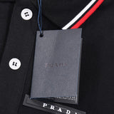 Flat lay presentation of Polo cotton polo shirt with monogram-inspired silhouette
