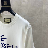 Close-up detail shot of Gucci luxury clothing with runway-inspired design