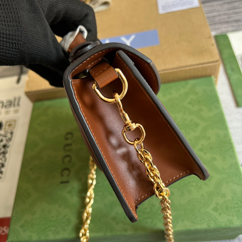 Side view of poised structured handbag
