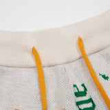 Side profile of Rhude luxury clothing with tailored silhouette