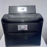 Side view of fluid structured handbag