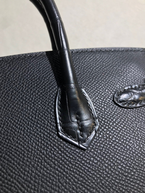 Side view of minimalist structured handbag