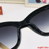 Close-up detail view of Cartier unisex sunglasses