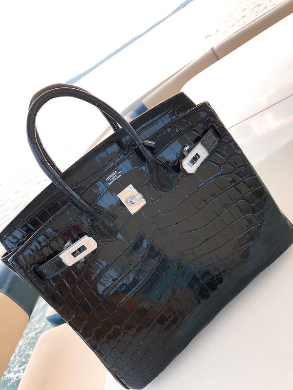 Side view of modernist structured handbag