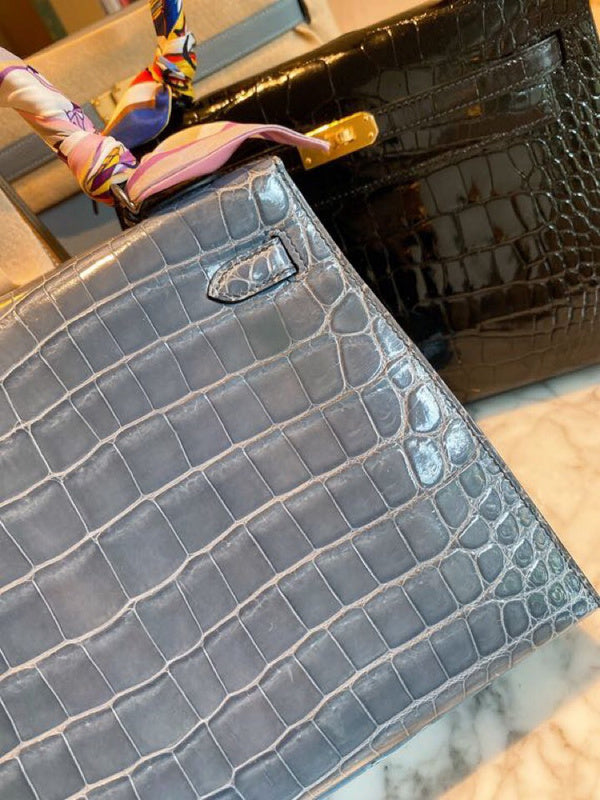 Side view of classic structured handbag
