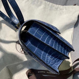 Side view of sophisticated structured handbag