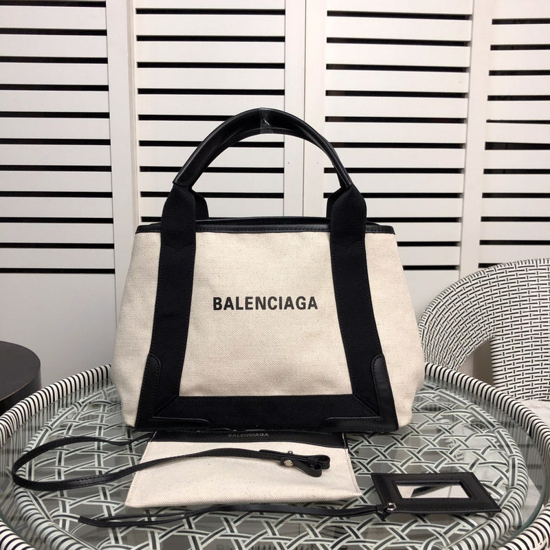Side profile of modern everyday-luxe women's handbag – women's statement bag