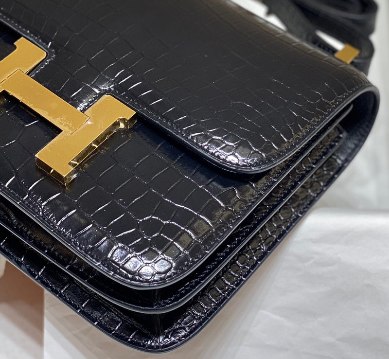 Side view of polished structured handbag