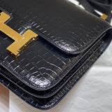 Side view of polished structured handbag