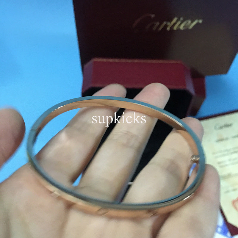 Front view of Cartier unisex jewelry piece
