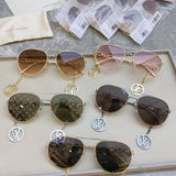 Lifestyle view of Louis Vuitton unisex sunglasses