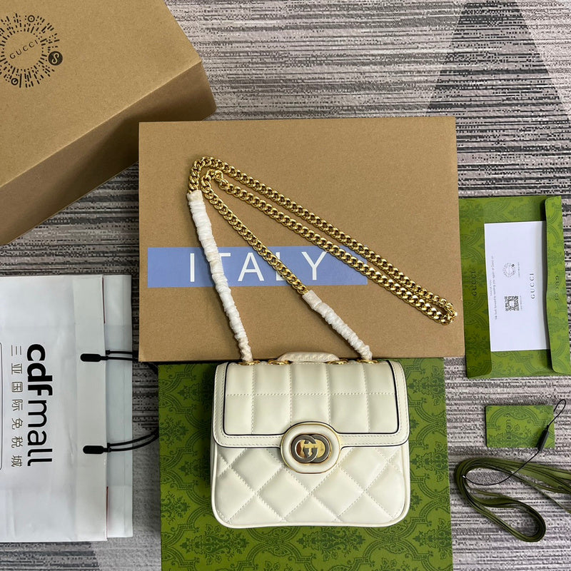 Front view of classic polished women's handbag – women's statement bag