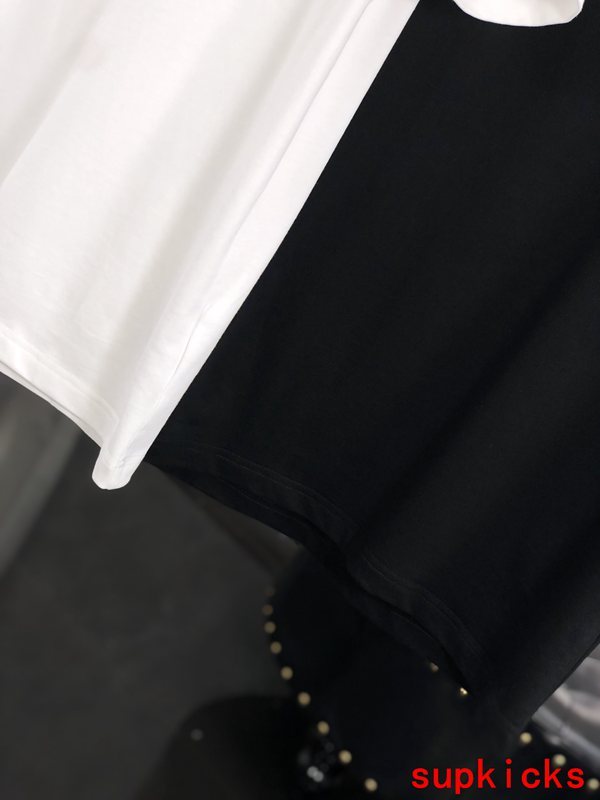 Flat lay presentation of Moncler luxury clothing with relaxed-fit cut