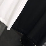Flat lay presentation of Moncler luxury clothing with relaxed-fit cut