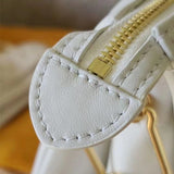Close-up detail of structured premium women's handbag – women's designer-style accessory