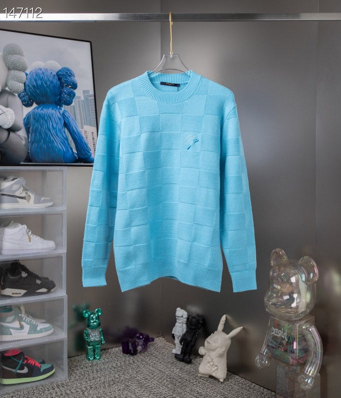 Close-up detail shot of Louis Vuitton luxury clothing with tailored silhouette