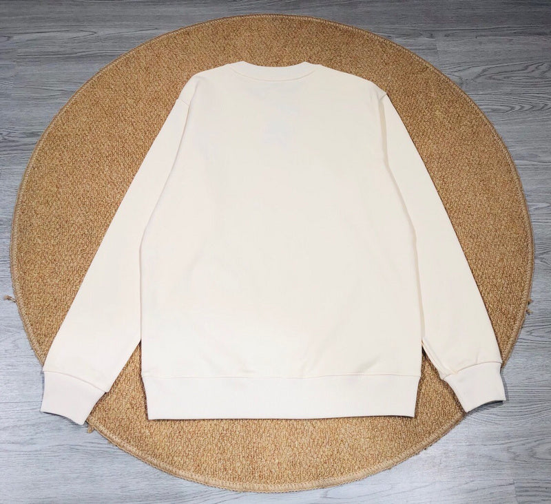 Front view of Gucci luxury clothing with monogram-inspired silhouette