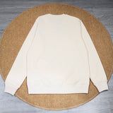Front view of Gucci luxury clothing with monogram-inspired silhouette