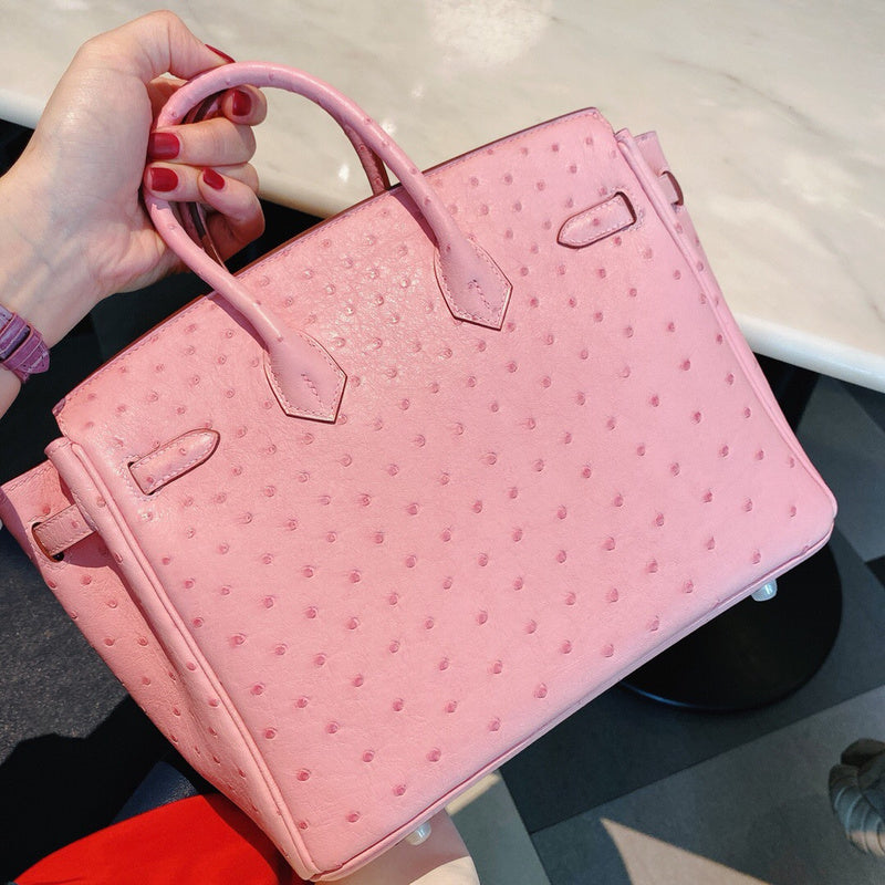 Side view of clean-lined structured handbag
