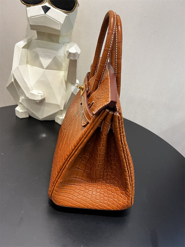  Timeless top-handle bag carried on shoulder 10