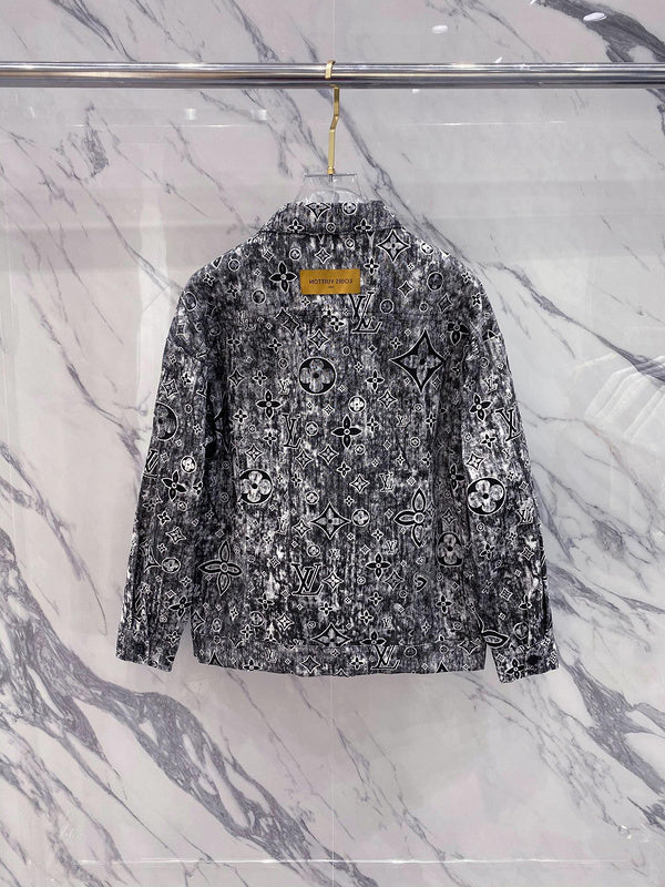 Close-up detail shot of Louis Vuitton luxury clothing with label-forward styling