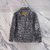 Close-up detail shot of Louis Vuitton luxury clothing with label-forward styling