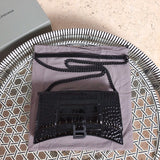Front view of chic classic women's handbag – women's luxury accessory