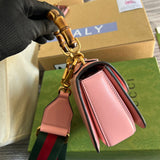 Back view of signature sleek women's handbag – women's statement bag
