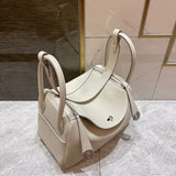 Side view of polished structured handbag
