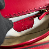 Side view of curated structured handbag