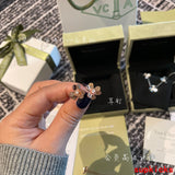 Lifestyle view of Van Cleef & Arpels unisex jewelry piece
