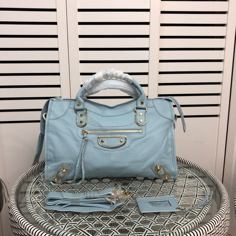 Side profile of statement chic women's handbag – women's statement bag