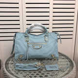Side profile of statement chic women's handbag – women's statement bag