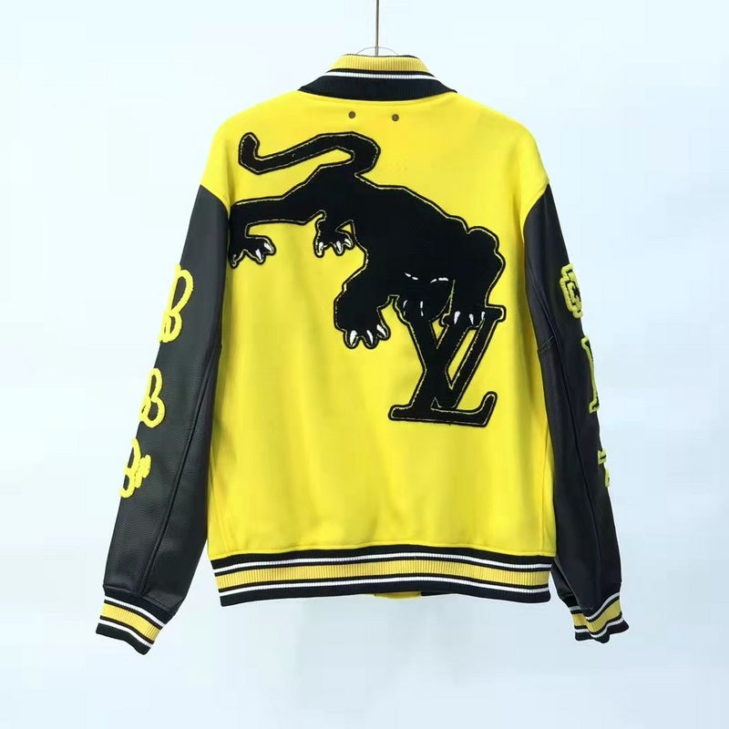 Close-up detail shot of Louis Vuitton luxury clothing with monogram-inspired silhouette