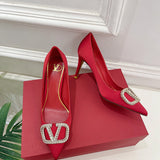 Side profile view of Valentino Garavani luxury piece style No.220