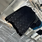 Close-up detail shot of Louis Vuitton luxury clothing with contemporary cut