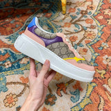 Gucci crisp white luxury sneakers view 5 retro runner design