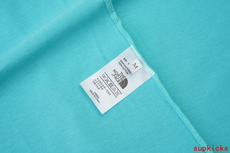 Close-up detail shot of Rhude luxury clothing with logo-detail design