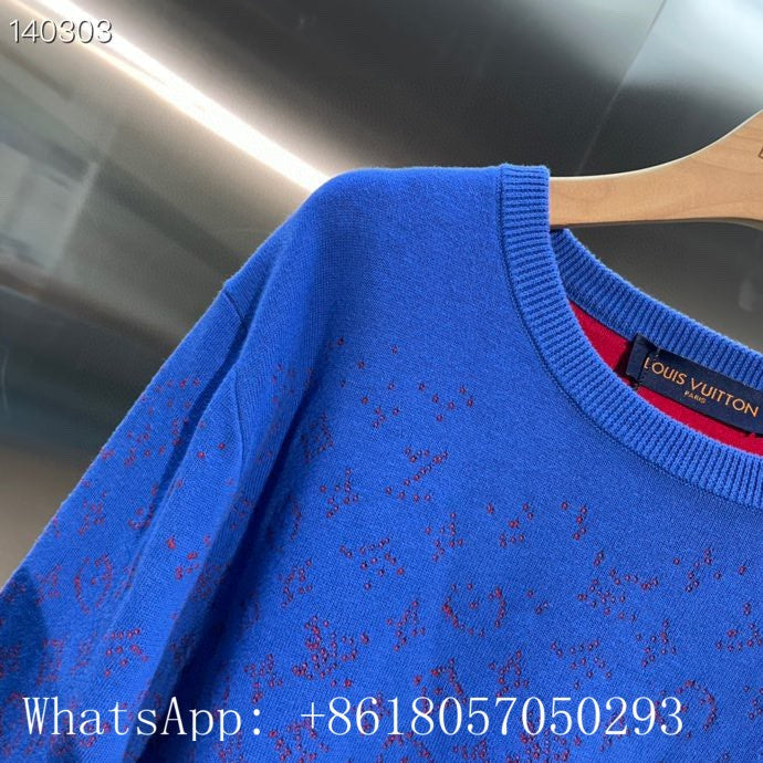 Close-up detail shot of Louis Vuitton luxury clothing with runway-inspired design