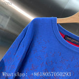 Close-up detail shot of Louis Vuitton luxury clothing with runway-inspired design