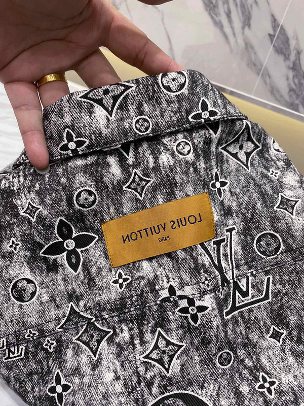 Back view of Louis Vuitton luxury clothing with label-forward styling