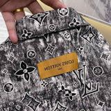Back view of Louis Vuitton luxury clothing with label-forward styling