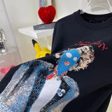 Back view of Louis Vuitton luxury clothing with runway-inspired design