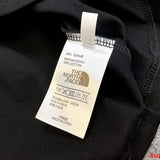Close-up detail shot of Rhude luxury clothing with logo-detail design